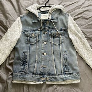 Denim jacket with sweatshirt sleeves and hood